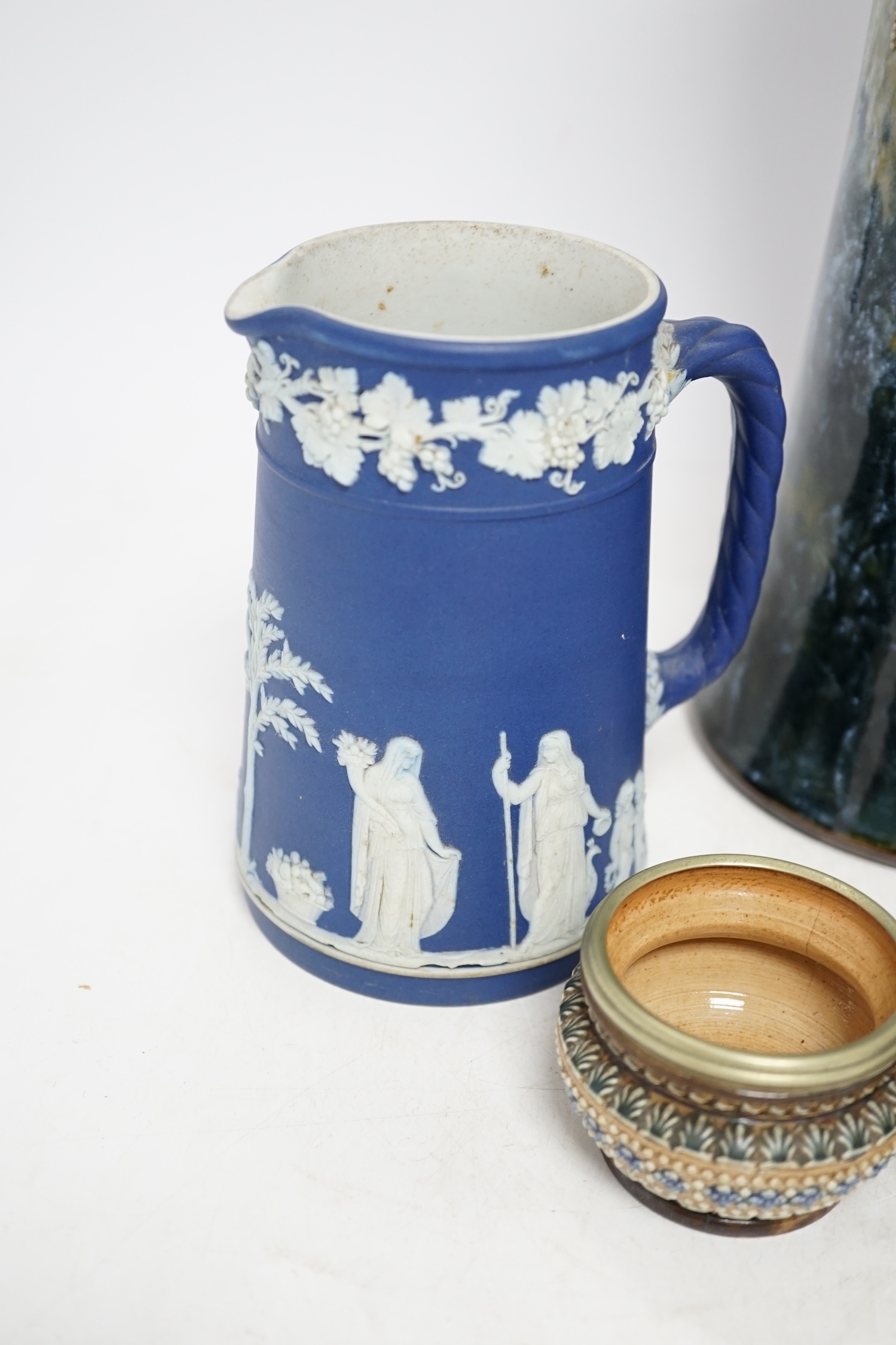 Five ceramic items comprising Doulton vase, two miniature Doulton pots, a Wedgwood jug and a blue and white jar, largest 33cm. Condition - two pots poor, others good